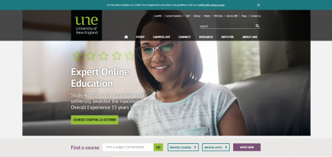 Screenshot of the UNE website homepage.